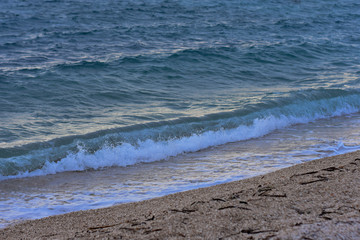 View from the beach at blue sea with little wave background