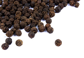 Pile of black pepper isolated on white background
