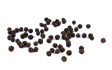 Pile of black pepper isolated on white background