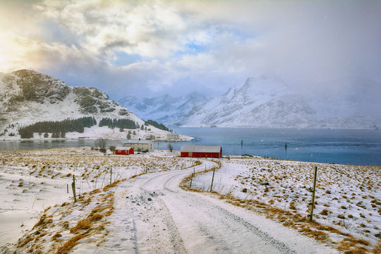 Beautiful winter landscape with traditional Norwegian fishing huts in the Lofoten islands, Norway