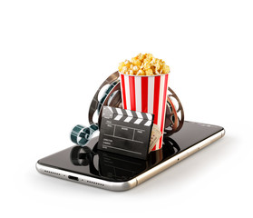 Smartphone application for online buying and booking cinema tickets. Live watching movies and video. Unusual 3D illustration of popcorn, cinema reel, disposable cup, clapper and tickets on smarthone © Vadim Georgiev