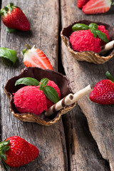 Ice cream, Strawberry sundae on wooden table. 