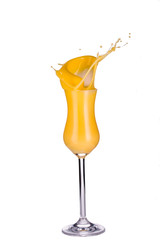 egg liqueur splash in glass isolated on white