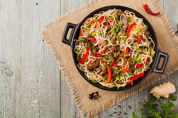 Chinese pasta with beef. Prepared in wok.