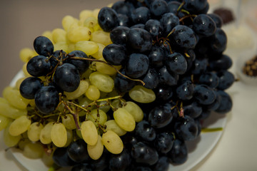 batch of fresh blue and green grape