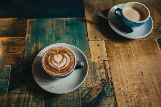 Cup of latte with flower