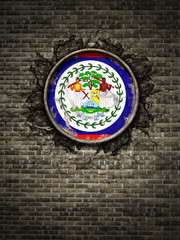 Old Belize flag in brick wall