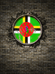 Old Dominica flag in brick wall