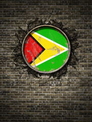 Old  Republic of Guyana flag in brick wall