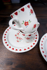 Empty pattern cups of tea with plates