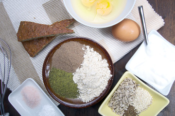 Fresh ingredients for preparation low carb healthy seed bread from pumpkin, flax and sesame flour