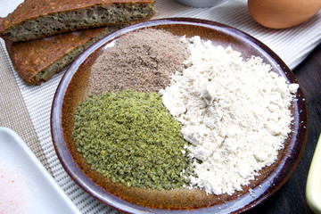 Fresh ingredients for preparation low carb healthy seed bread from pumpkin, flax and sesame flour