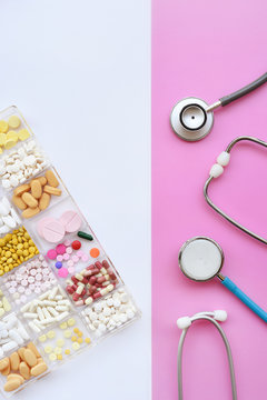 Different medication with stethoscope for background