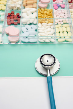 Different medication with stethoscope for background