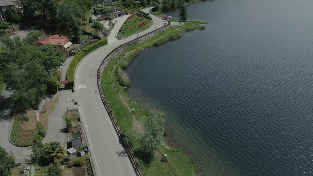 bicycle sumer italy Italian riviera houses drone flight near the mountains, Italy lake, drone 4k nature flight hootel