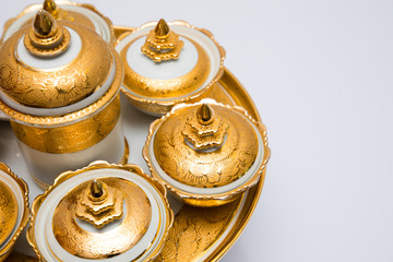 Traditional Thai benjarong ceramic bowls on white background