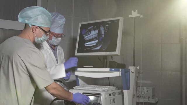 doctor and assistant doctor work for medical equipment