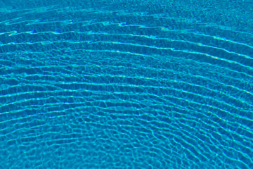 water texture in a pool with waves and reflection