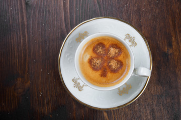 Closeup of cup of coffee with pattern and nice design