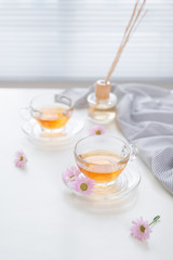 Cup of tea on the windowsill. Tea time.