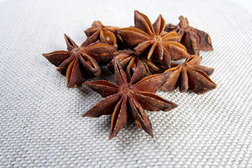 Sweet anise star seeds on white background