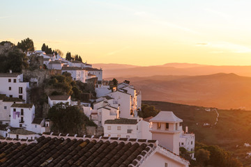 Obraz premium White houses old town mountain sunset