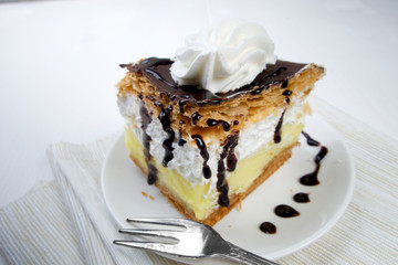 Sweet French delicious chocolate and cream cake - French cube - Kremes