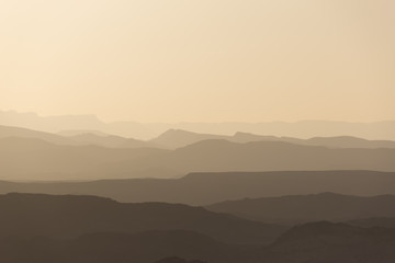 mountain silhouette in the Negev desert in Israel at sunset sunrise