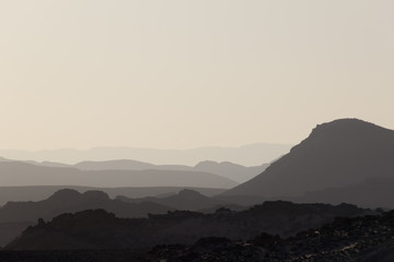 mountain silhouette in the Negev desert in Israel at sunset sunrise