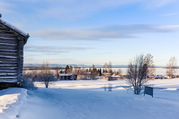 dalarna Sweden view houses lake in winter