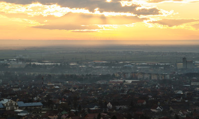 Fototapeta na wymiar Cityscape in a setting sun