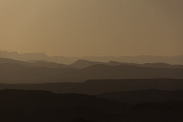 mountain silhouette in the Negev desert in Israel at sunset sunrise