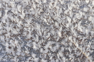 Snowflakes close-up on the table top, background texture