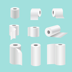 Vector illustration set of realistic paper rolls isolated on blue background. Blank white 3d kitchen towels, toilet paper in different positions.