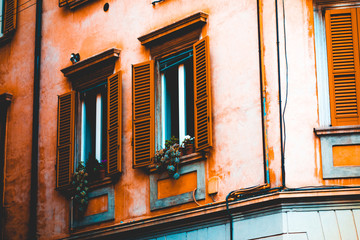 Fototapeta na wymiar old windows on mediterranean facade