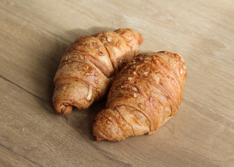French Ham and cheese Croissant on wooden background