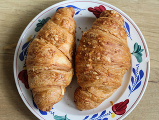 French Ham and cheese Croissant on wooden background