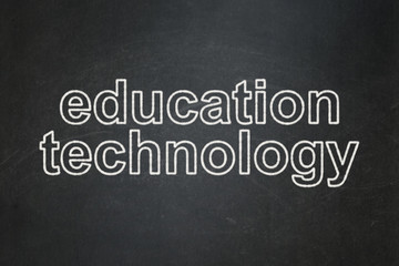 Studying concept: text Education Technology on Black chalkboard background