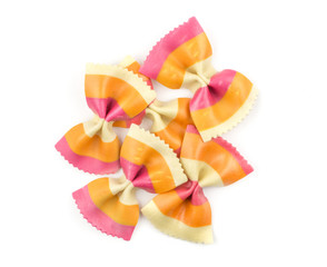 Farfalle pasta with orange carrot and red beetroot isolated on white background top view five set raw classic traditional Italian.