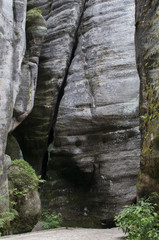 Fototapeta na wymiar The narrow path among high rocks (Adrspach Rock City) 