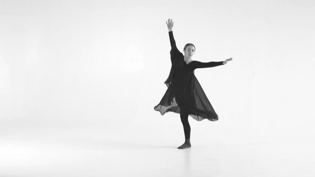 young woman professional dancer. modern staging choreography. contemporary style. girl dancing on white isolated background. 4K