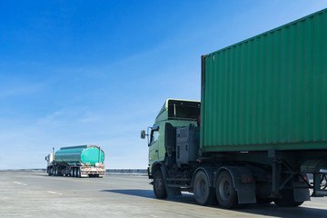 Truck on highway road with container, transportation concept.,import,export logistic industrial Transporting Land transport on the asphalt expressway with blue sky