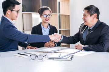 Finishing up a meeting, Business handshake after discussing good deal of Trading contract for both companies and gesturing people connection deal, Meeting and greeting concept