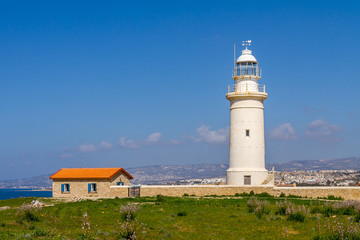 Fototapeta na wymiar Lighthouse near the ancient Odeon Amphitheatre. Paphos, Cyprus