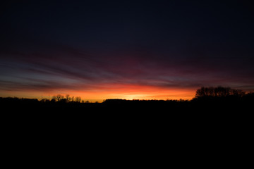 Orange, Red, Blue, Pink, Purple Silhouette of Horizon