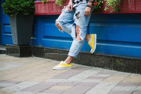 Bright Yellow Sneakers And Jeans