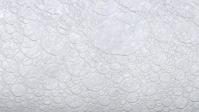 foam blue texture soap bubbles on the water
