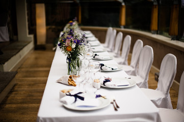 tables set for wedding gala dinner