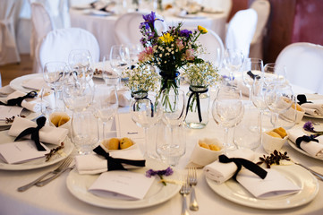 tables set for wedding gala dinner