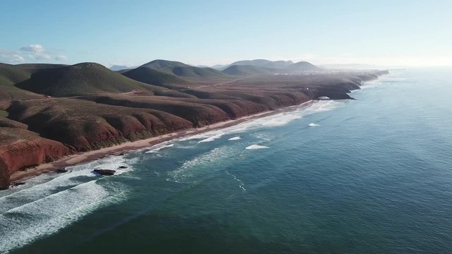 Aerial view on Legzira beach with arched rocks on the Atlantic coast in Morocco, 4k
